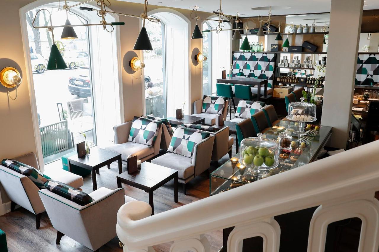 המבורג Fairmont Hotel Vier Jahreszeiten מראה חיצוני תמונה The interior of the restaurant